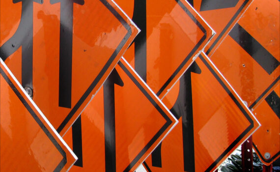 Orange and Black Construction Signs